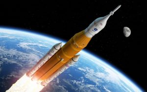Artemis II rocket blasting away from earth